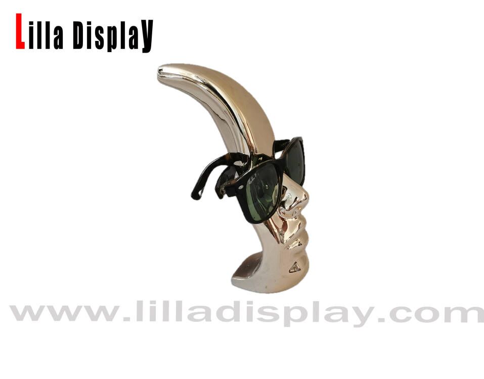 Sunglasses display gold color female mannequin head Lily